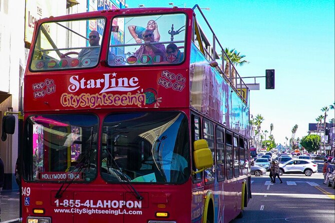 City Sightseeing Hop-On Hop-Off Bus Tour with Audio Guide - Downtown Purple Route: civic landmarks and city neighborhoods