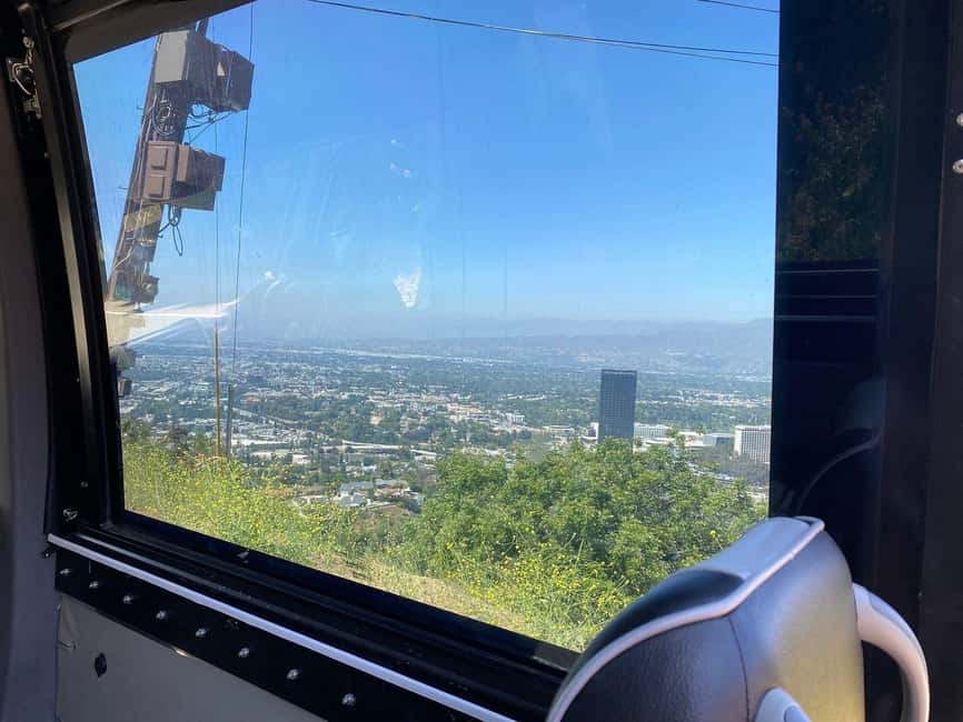 Los Angeles: Celebrity Homes and Movie Scenes Bus Tour - The Hollywood Sign and the hills above town